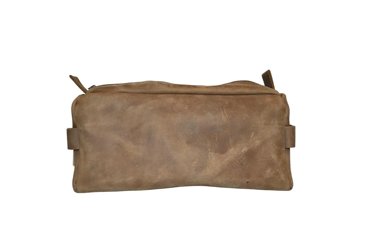 Genuine leather toiletry bag Stylish organization Handcrafted in Honduras 100% genuine leather Zipper closure with braided pull Convenient handle Quality and durability Secure storage (Stone)