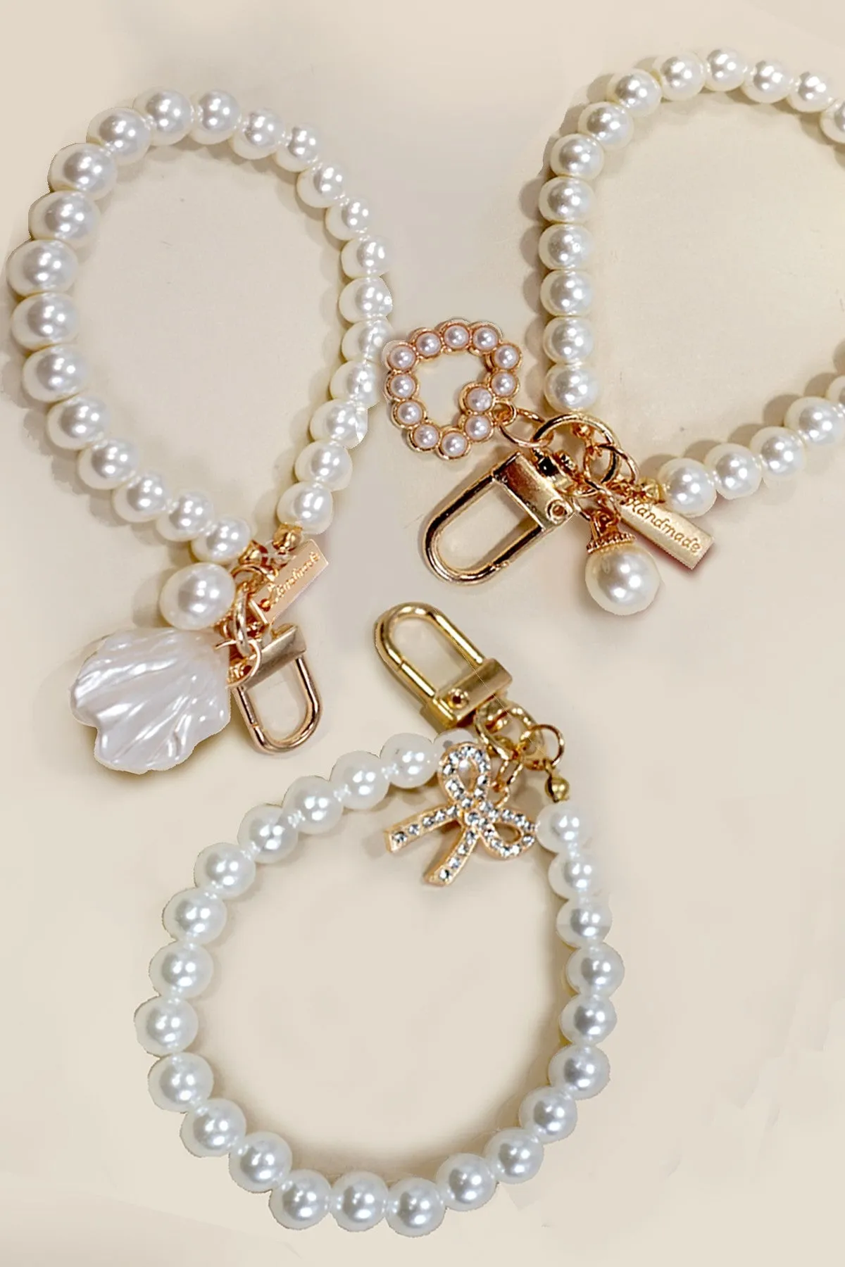 PEARL WRISTLET BOW HEART SEASHELL BAG KEYCHAINS | 40KC134